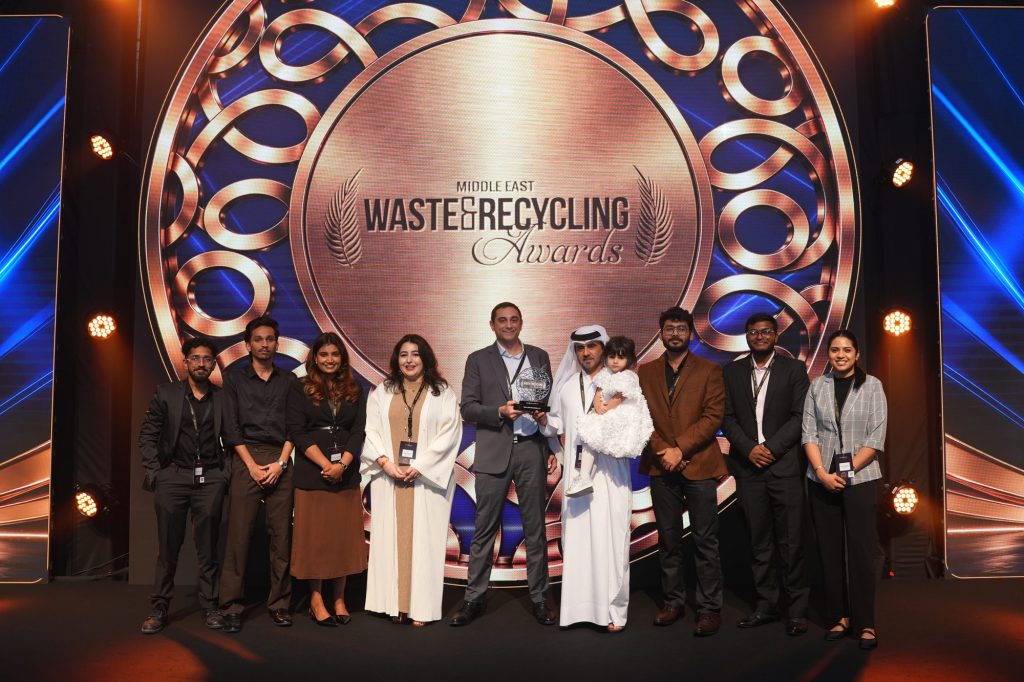 Green Vision Consultants team on stage receiving the Sustainability Initiative of the Year award at the Middle East Waste & Recycling Awards (MEWAR) 2026